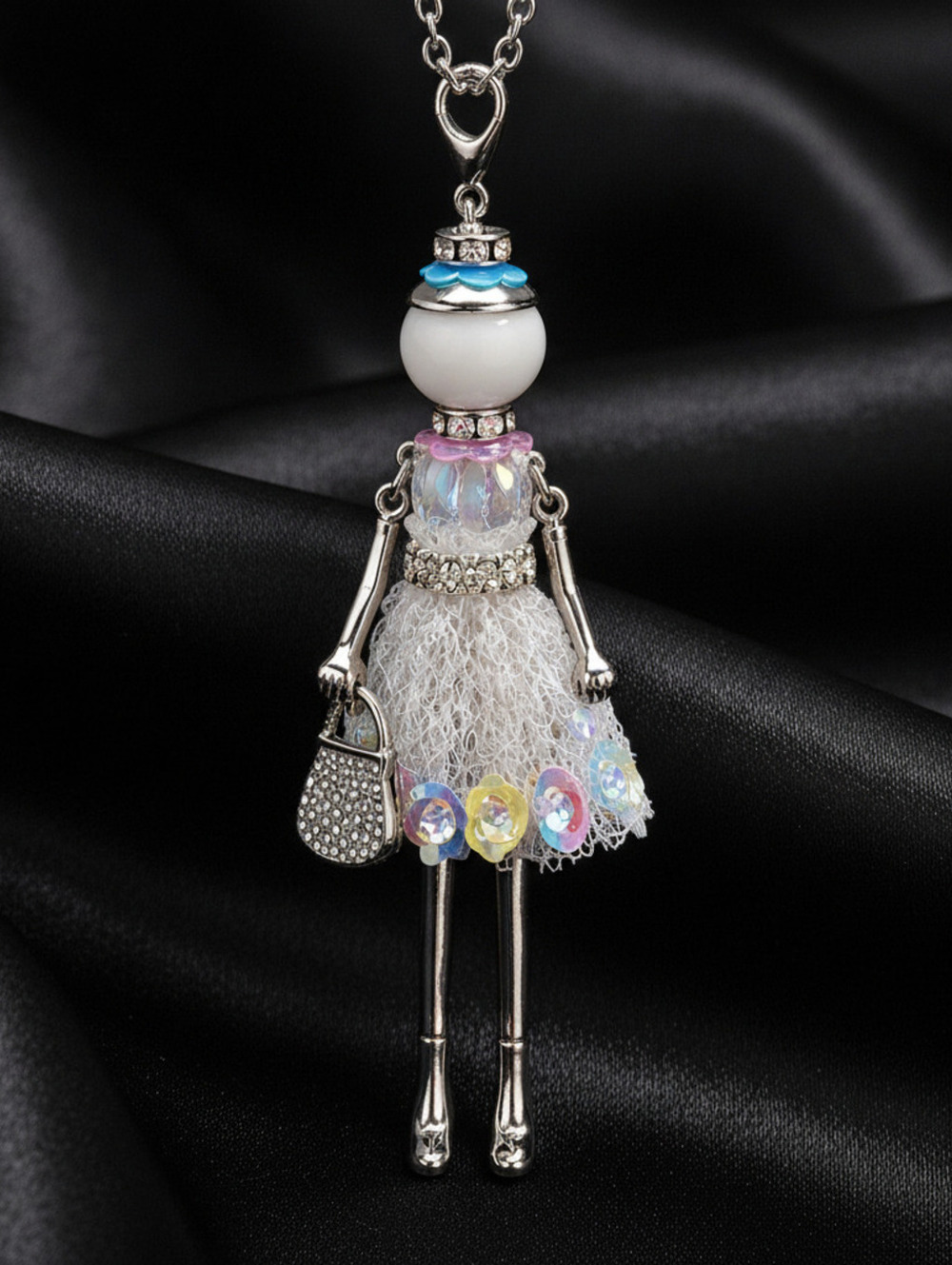 Elegant Silver Doll Pendant Necklace with Colorful Accents and Handbag Charm